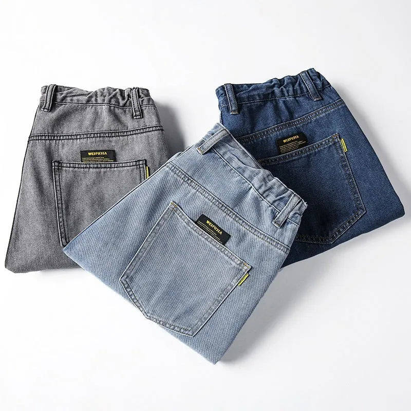 Men's loose straight simple jeans in dark blue cotton with mid waist and zipper fly available in plus sizes