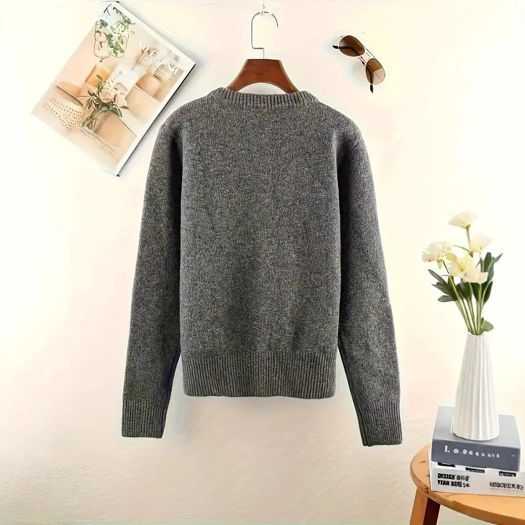 Dark grey women's button-front polyester cardigan on a hanger.
