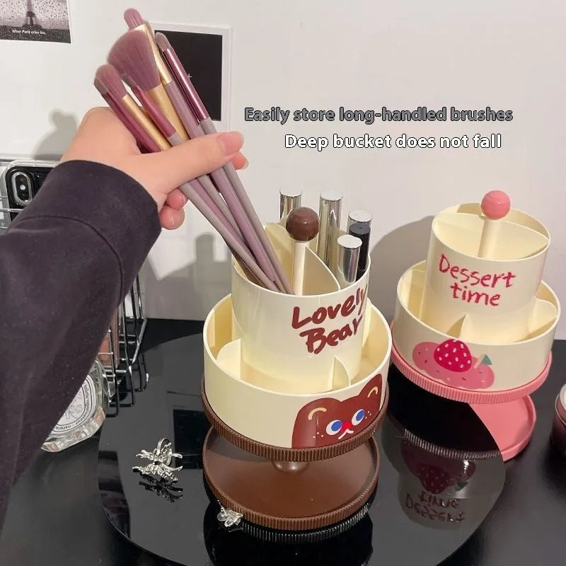 Rotating beige cosmetic brush storage barrel with 18-litre capacity and a separate storage rack on a table.