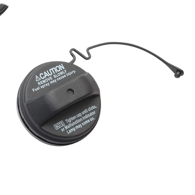 Black plastic Toyota fuel tank cap with snap-type fitting mechanism