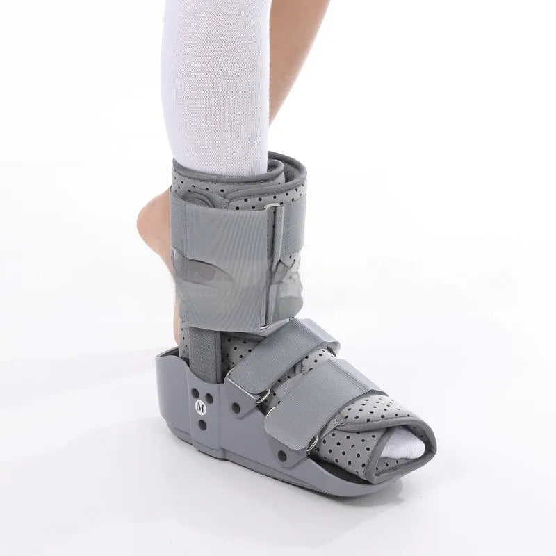 Grey achilles tendon rehabilitation boot with adjustable aluminium support plate