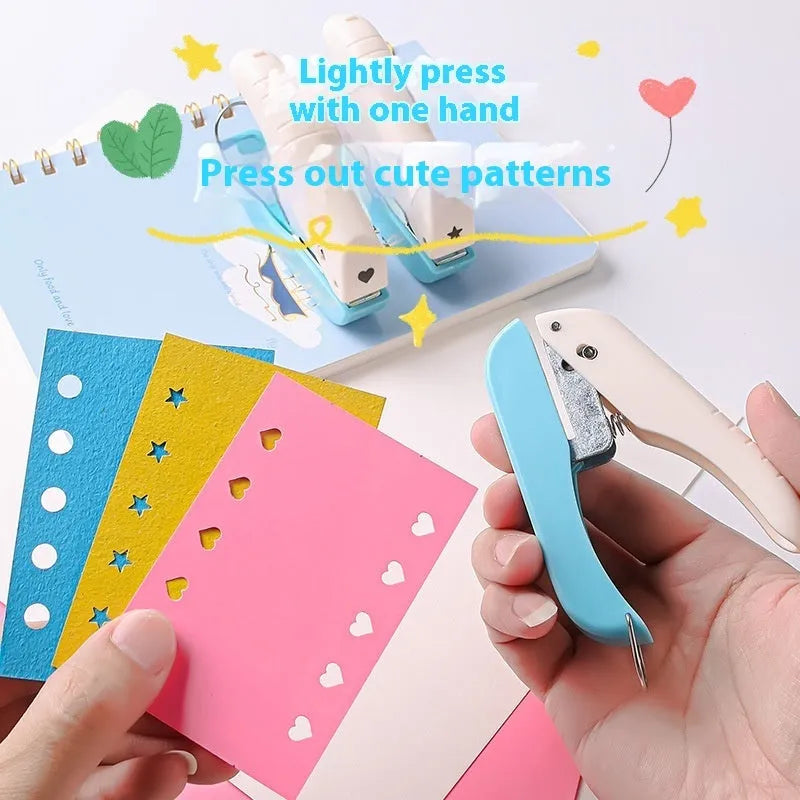 Small manual embossing punching machine with love, star, and round pattern discs for paper crafts.