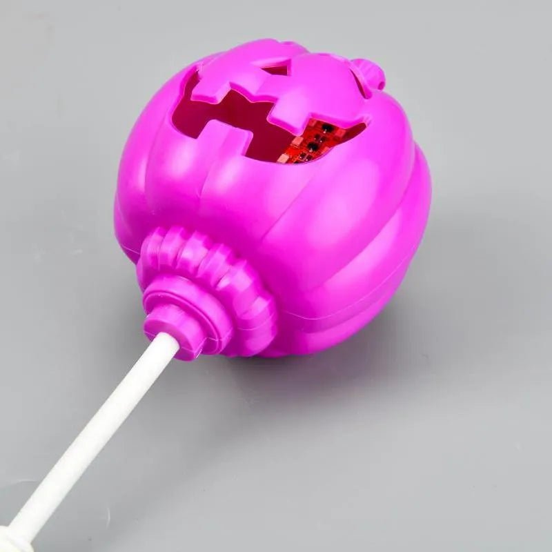USB-powered plastic pumpkin decorative lamp showing yellow or purple light option