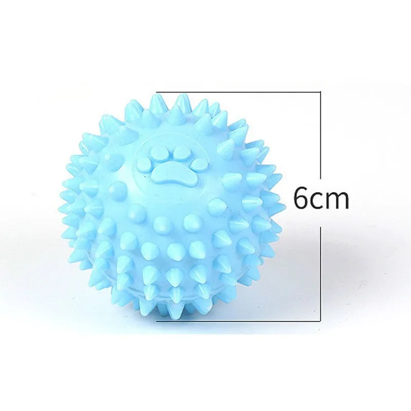 Blue TPR dog chewing ball with footprint design and bulging sides for tooth cleaning.