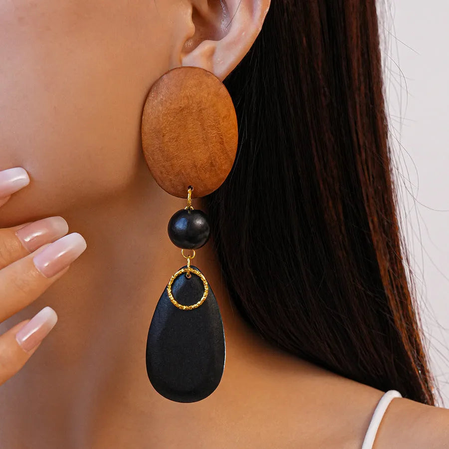 Handmade wooden retro earrings with elliptical design in silver-brown-black colours