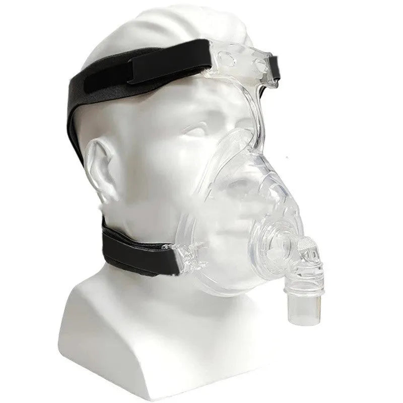 Transparent CPAP breathing mask with silicone and PC materials, headgear, and adapter elbows.