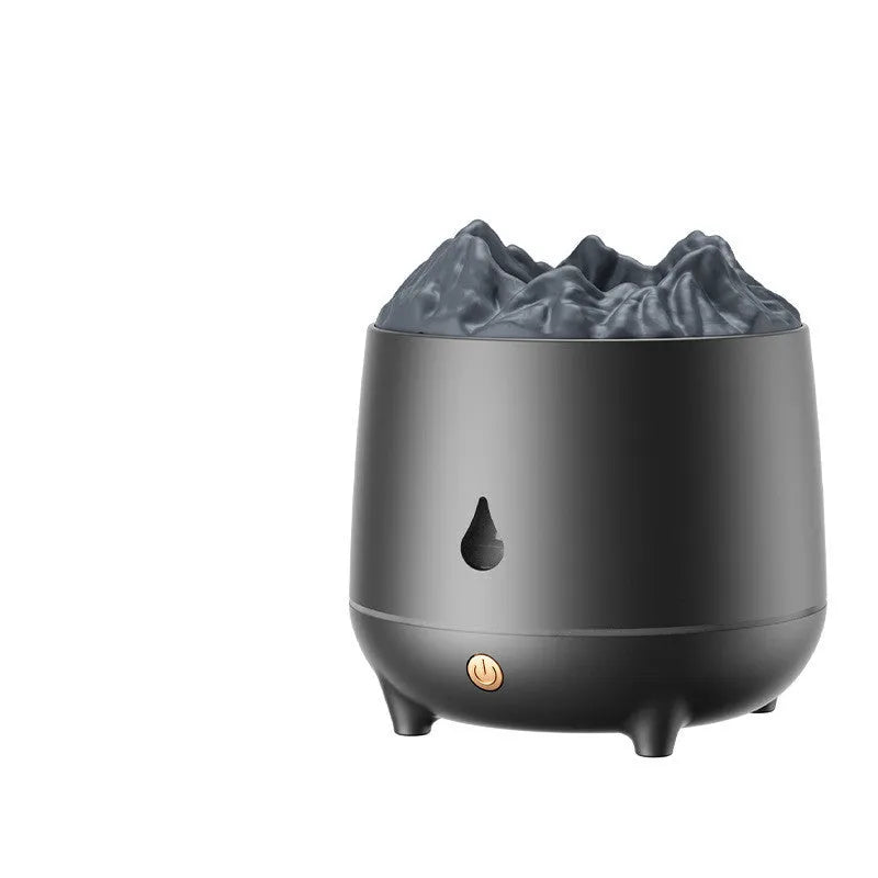 Black volcanic sculpture USB humidifier and aromatherapy diffuser on a wooden surface.