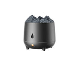 Black volcanic sculpture USB humidifier and aromatherapy diffuser on a wooden surface.