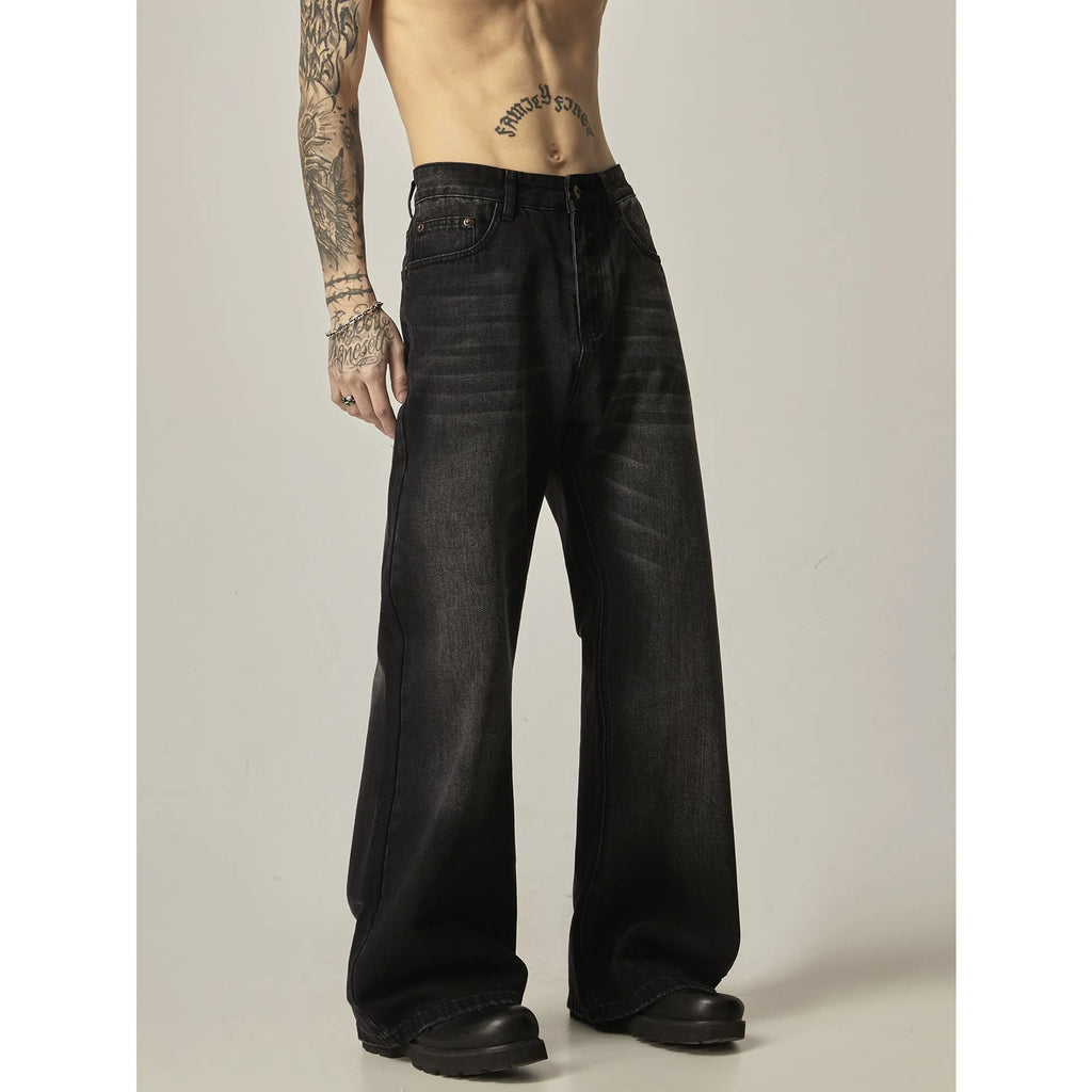 Black loose straight-leg retro jeans with zip fly opening on mannequin