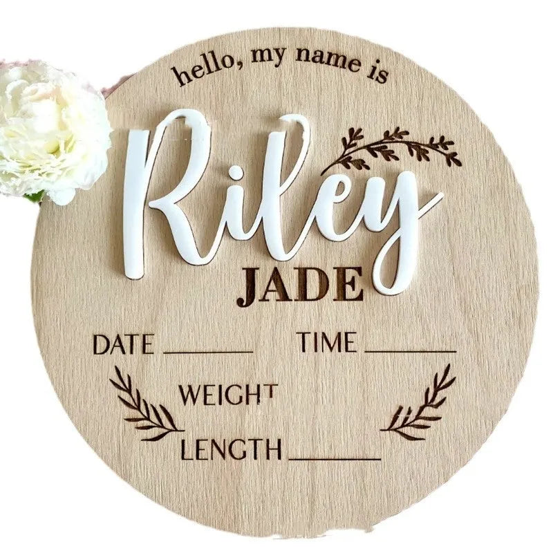 Personalised wooden square sign with baby's name, birth date, time, and weight engraved.