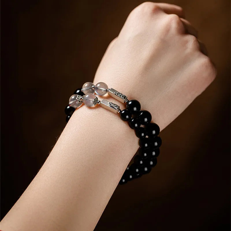 Obsidian Buddha beads couple bracelet DIY set showing 10mm men's and 8mm women's beads with national style patterns