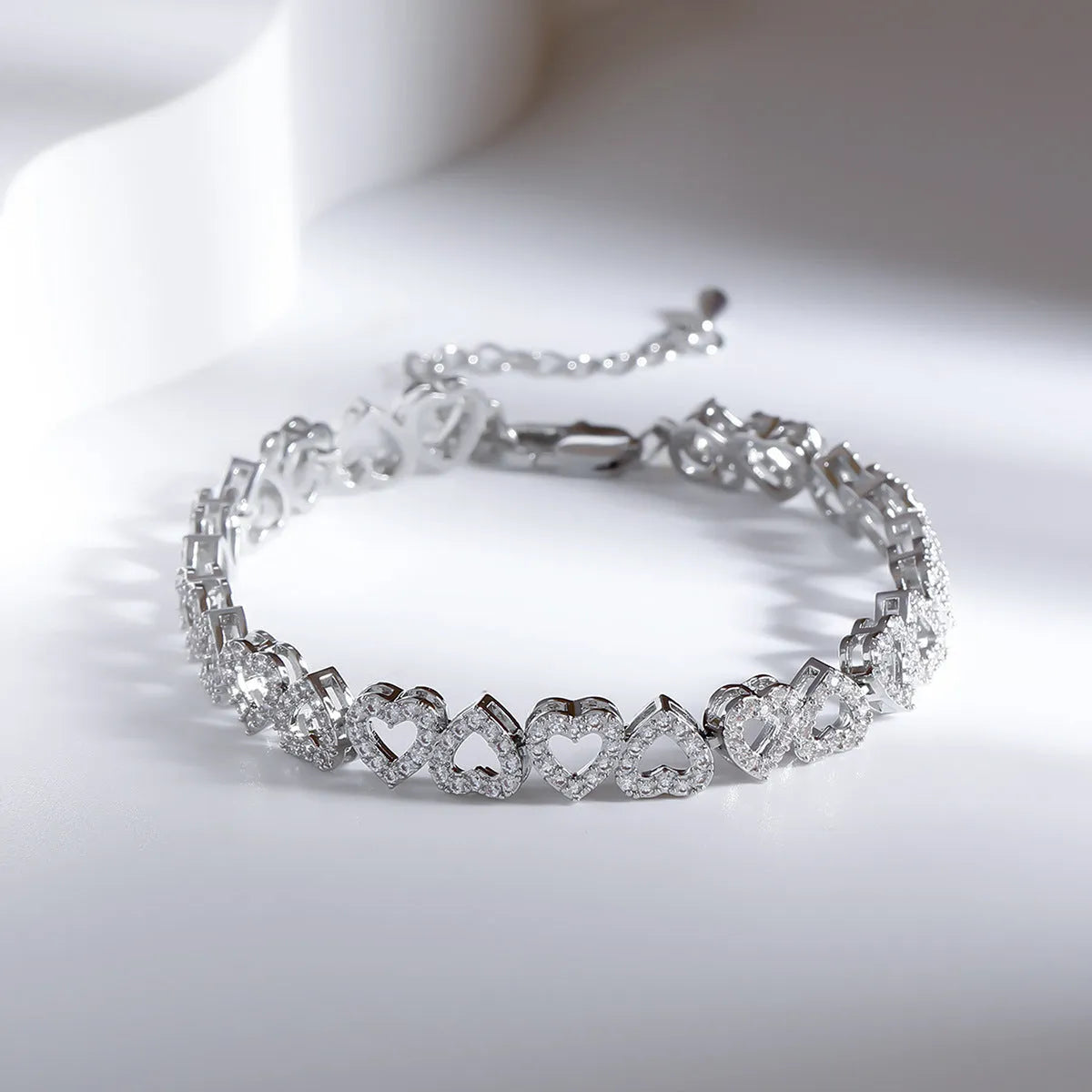 Girl's diamond bracelet with full diamond heart, silver electroplated finish, copper base, heart shaped jewellery for women