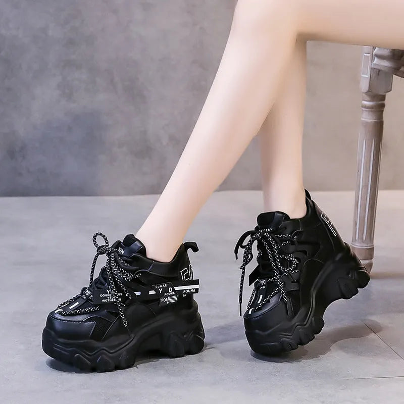 Women's white mesh platform sports shoes with cross-strap design and rubber sole