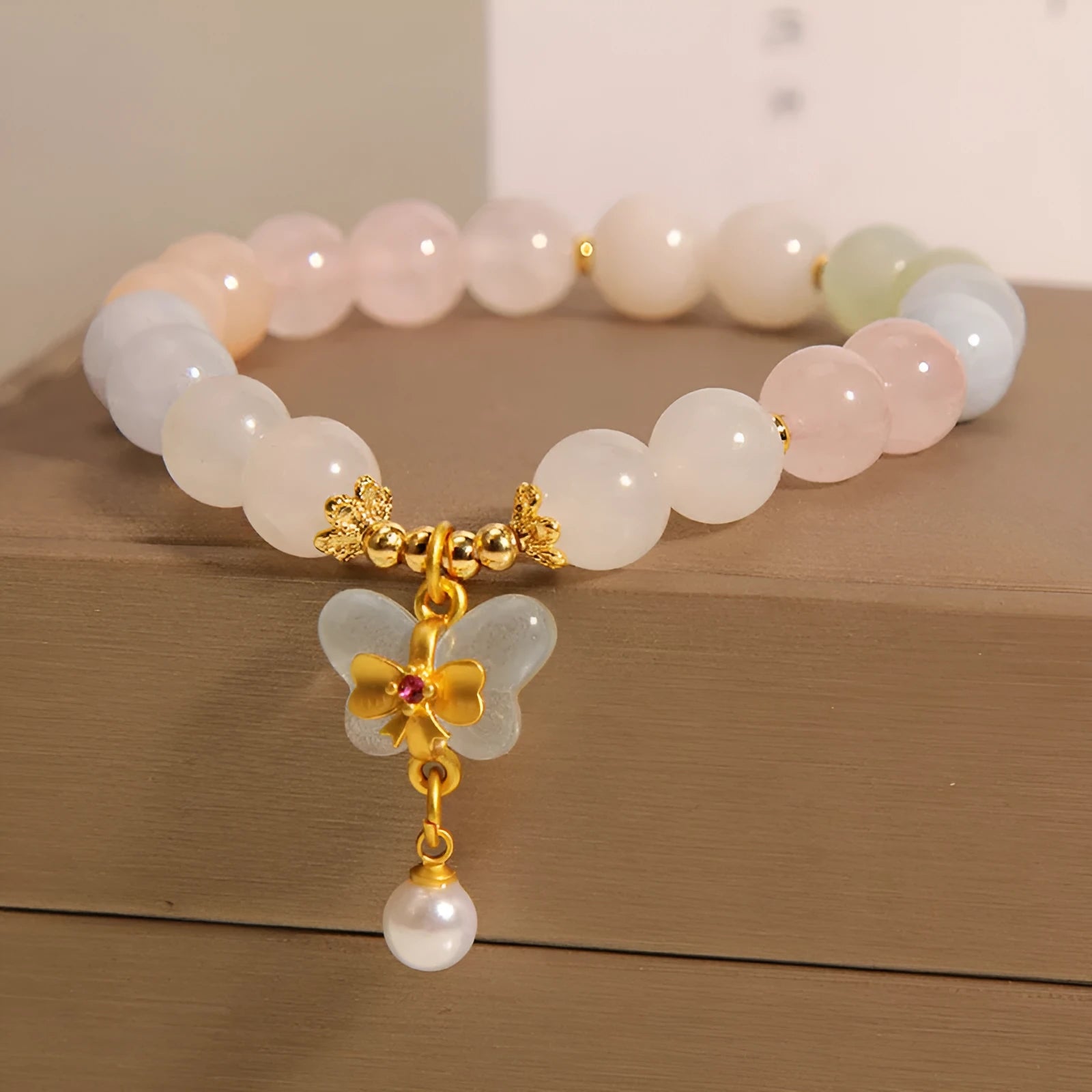 Women's morganite bracelet with colourful crystal jade beads and butterfly pendant in candy colours