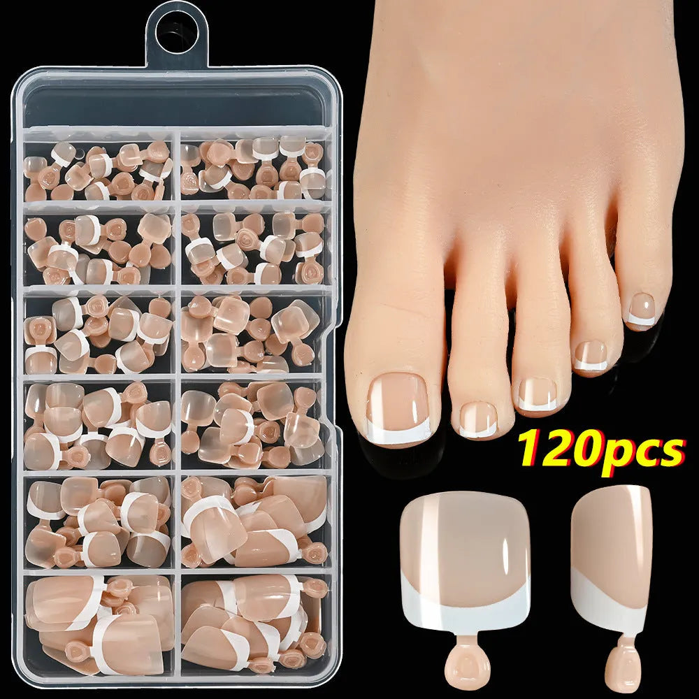 Box of 120 French white edge artificial toenails in square short shape, showing nine nude colour shades.