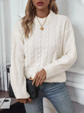 Women's twist design casual sweater in beige colour showing loose fit and round neckline