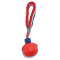 Blue natural rubber dog ball with rope attached measuring 6.5cm diameter