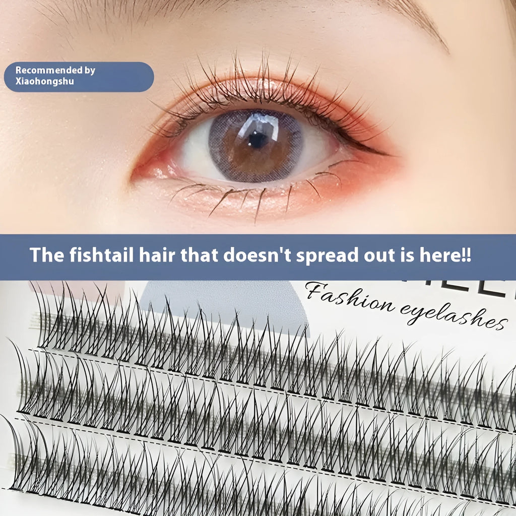 Black V-shaped fairy fishtail false eyelashes with thick segments on a clear tray.