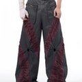 Men's slim-fit grey trousers with textured keel detailing on the legs.