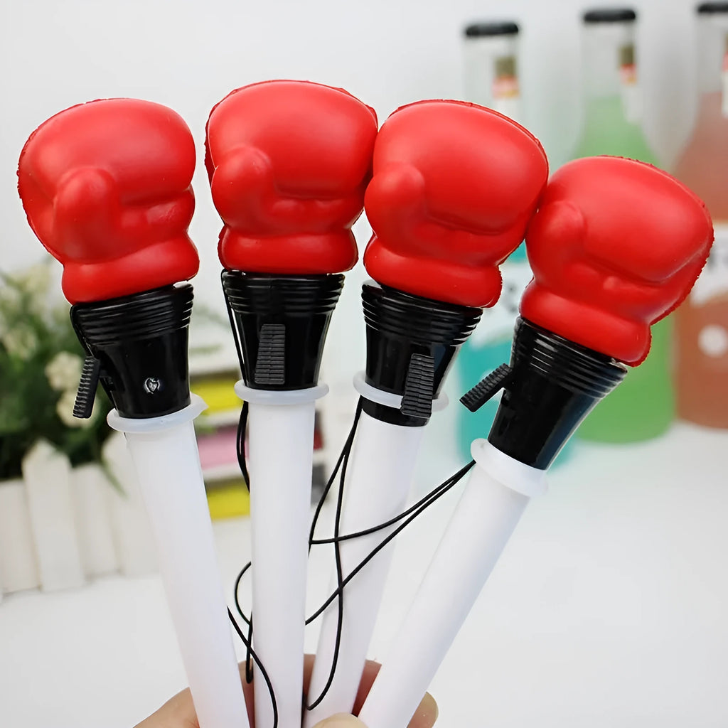 Set of four black pressure relief pens with boxing press mechanism and 0.7mm tips.