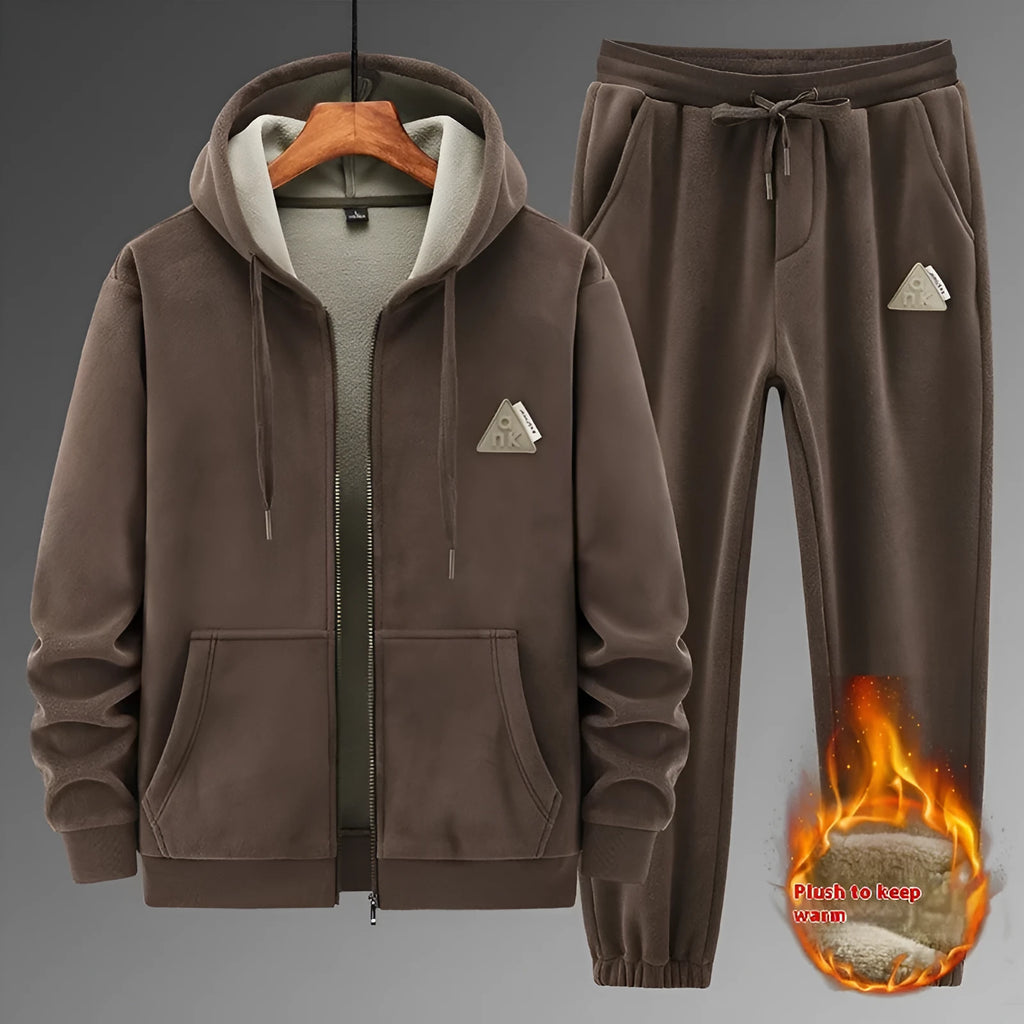 Grey cashmere-blend hooded sweater and matching trousers men's sports suit set on a hanger.