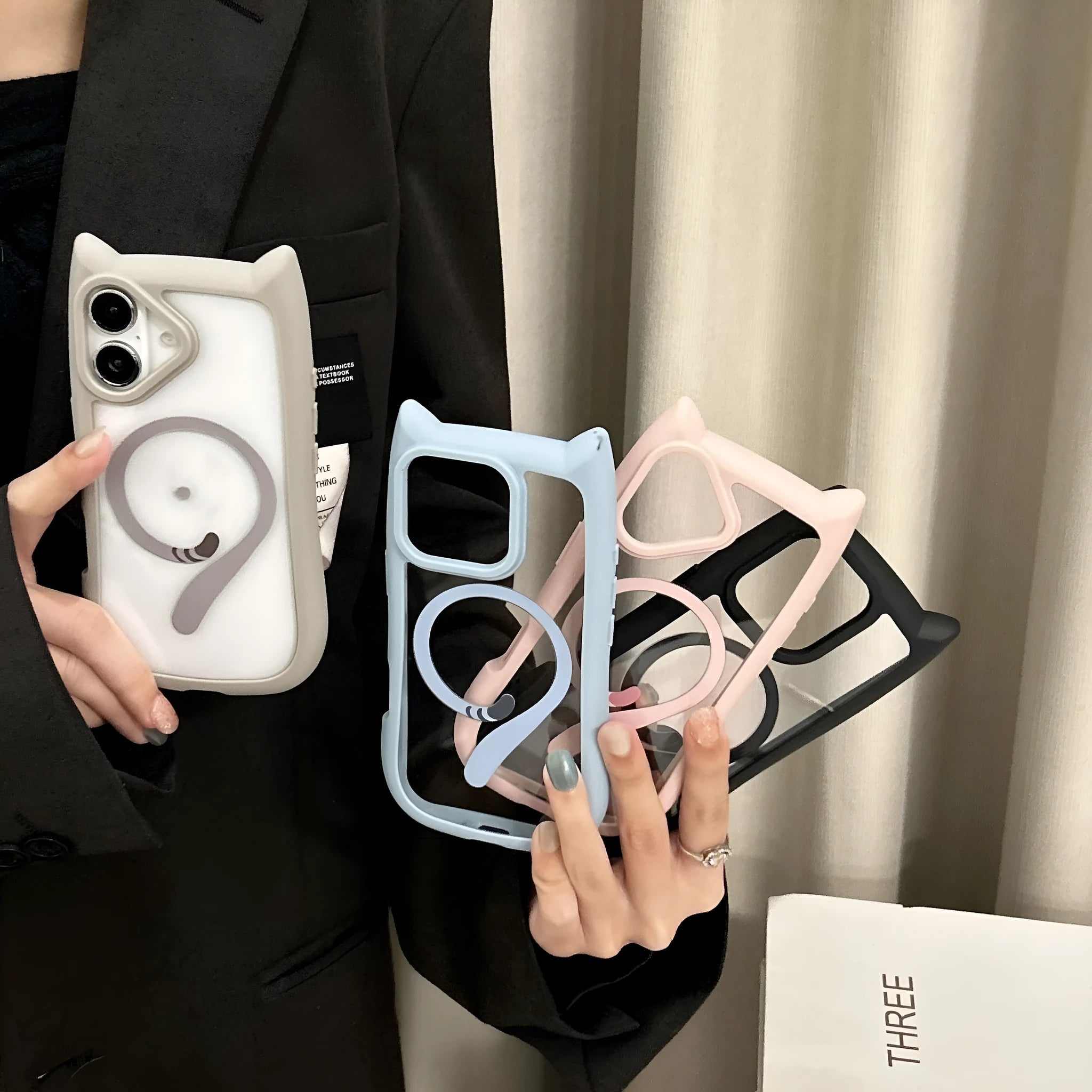 Transparent acrylic TPU phone case showing magnetic elements and wave pattern design for iPhone 17