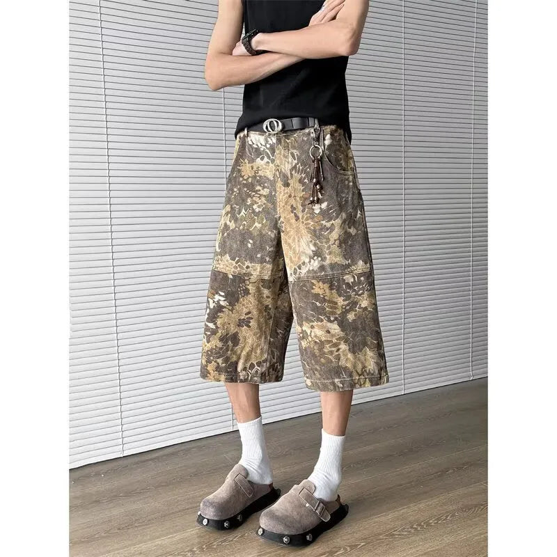 Yellow snake pattern camouflage cropped jeans on a denim background