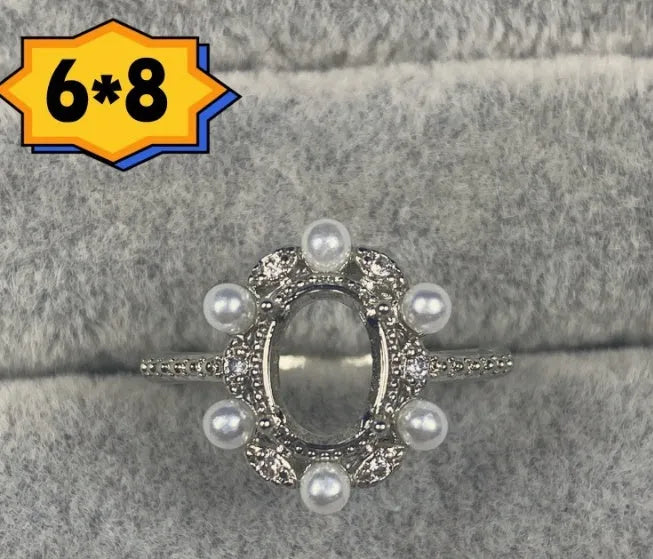 Korean style open mouth copper ring with 6x8mm oval denier stone and star decorations.