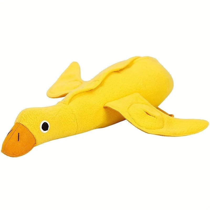 Yellow teddy fabric duck-shaped dog toy with squeaker and hidden food compartment
