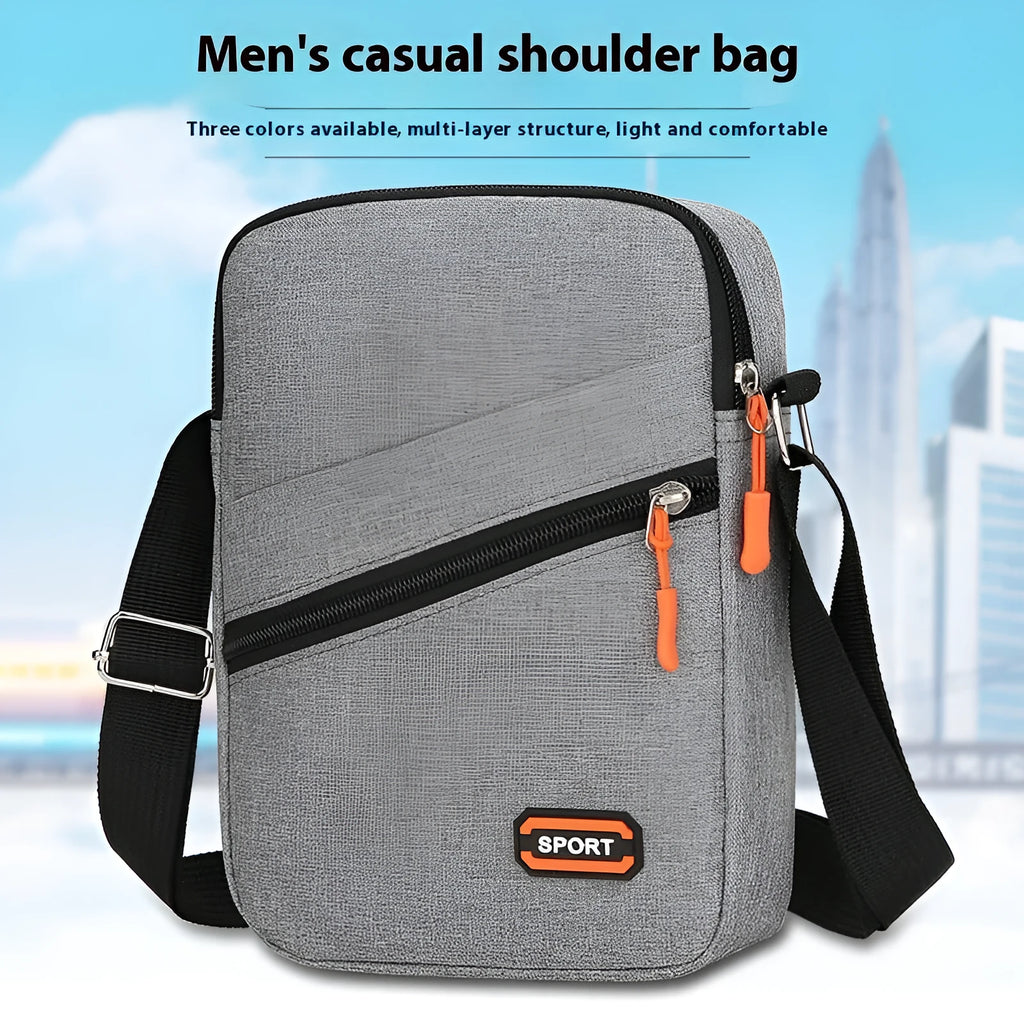 Lightweight Oxford cloth crossbody commuter bag in a solid colour with contrast detailing.