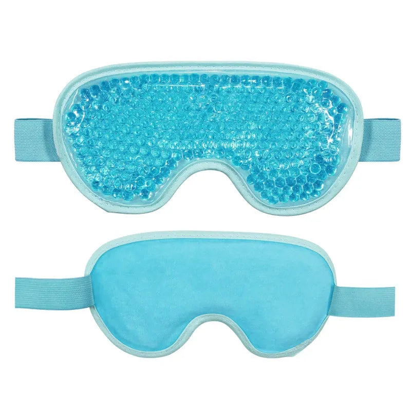 White rechargeable eye massager device with warm compress and atomisation cleaning functions, shown with included eye mask.