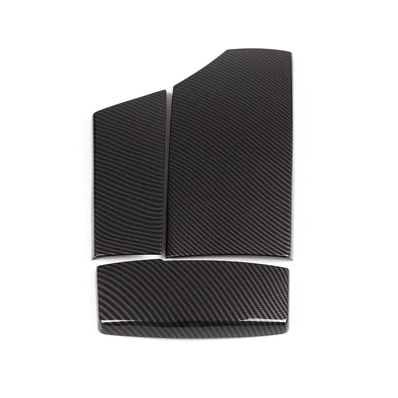 Three-piece set of black ABS armrest box protective covers with shiny carbon fibre pattern for car centre console.