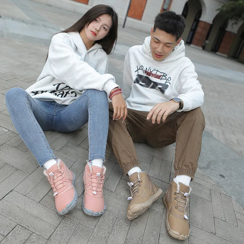 Pair of front lace-up snow boots with round toe, showing black umbrella cloth upper and rubber sole.