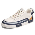 Men's white and green canvas casual shoes with mesh ventilation panels and flat heel