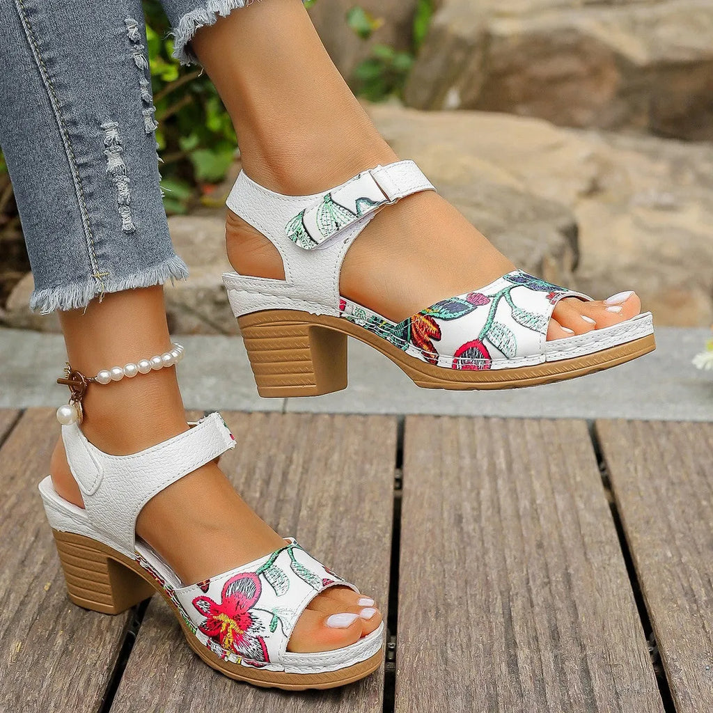White women's high heel sandals with adjustable Velcro buckle strap on a casual rubber sole.