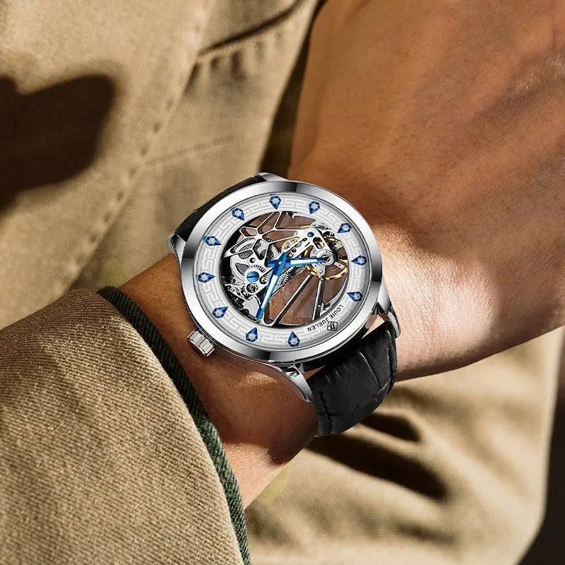 Men's silver mechanical watch with white dial, blue hands, black leather strap and butterfly buckle