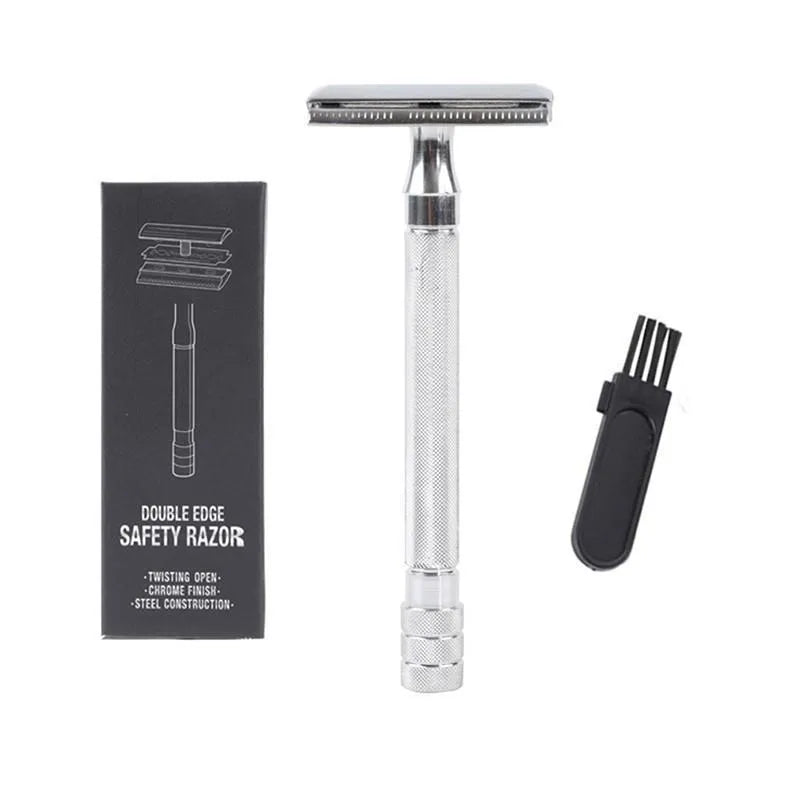 Traditional manual shaving razor and brush set in silver and black finish on a wooden surface.