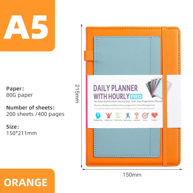 A6 self-filled notebook with PU cover in various colours, shown open on wooden table.