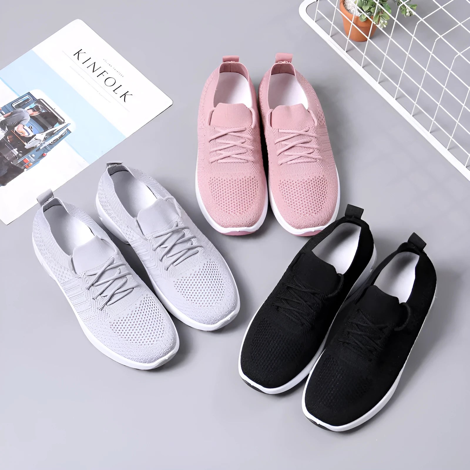 Women's black mesh lace-up casual sneaker with round toe and soft PVC sole.