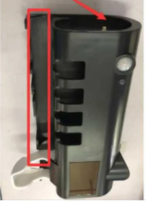 Black smart UV toothbrush steriliser with automatic toothpaste squeezer mounted on a bathroom wall