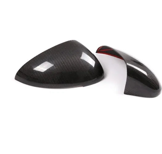 Pair of matte black true carbon fibre rearview mirror covers for a Porsche Macan.