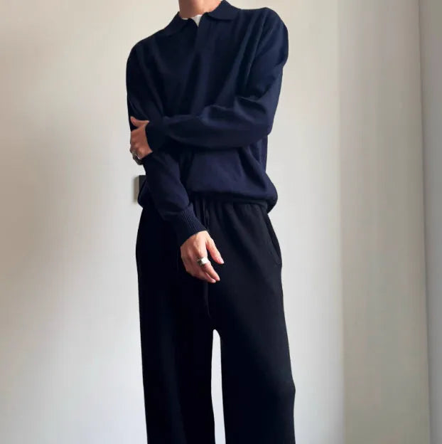 Pure wool lapel-collar polo sweater in a loose fit, shown in milky white.