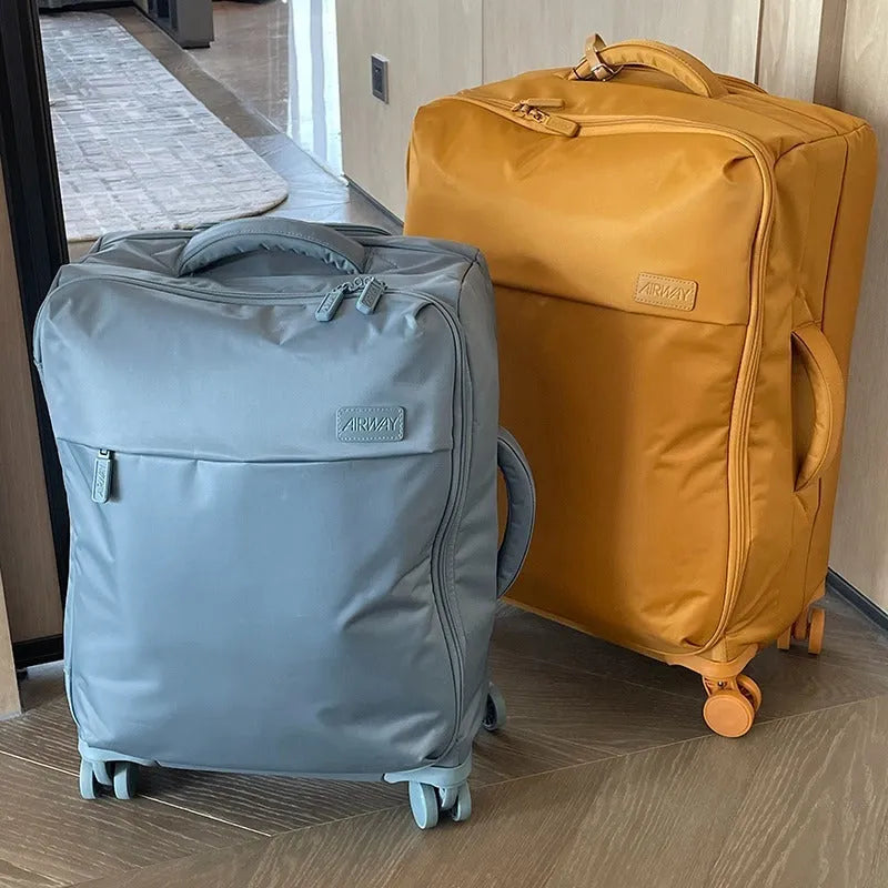 Ultra-light waterproof Oxford cloth suitcase with universal wheels in bluestone green colour