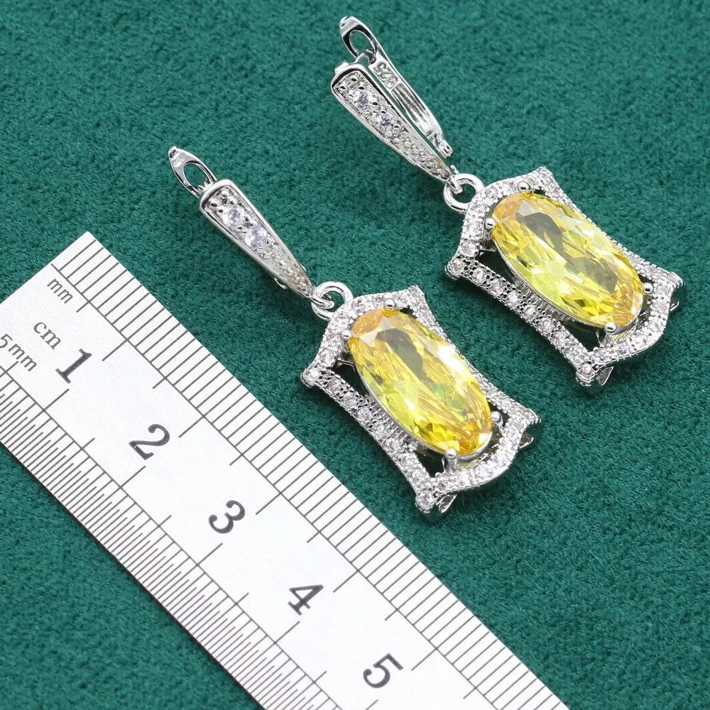 Anti-allergy zircon jewellery set with snake bone chain necklace, earrings, ring, and bracelet in yellow or olive.