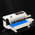 Handheld mini steel sealing machine for printing dates on plastic packaging films.