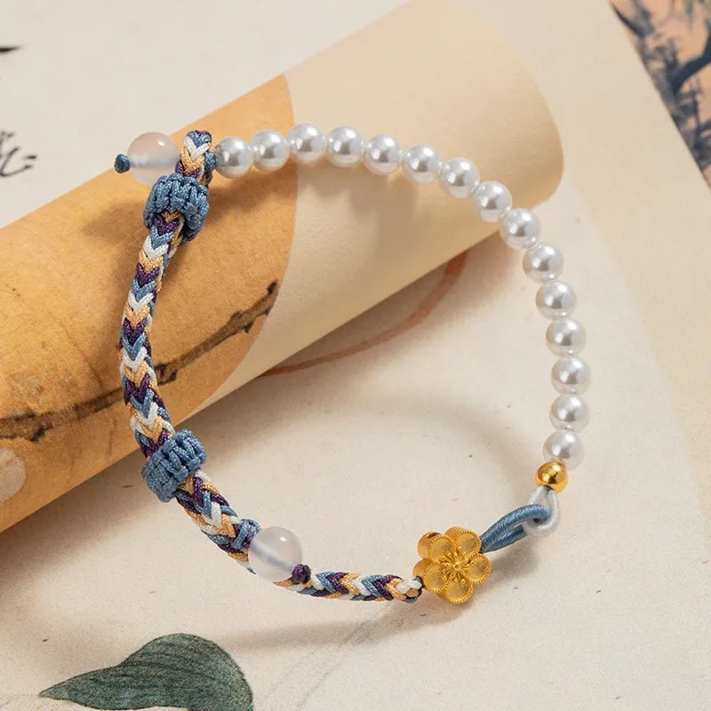 Peach coloured Chinese flower weaving carrying strap with sterling silver chalcedony and pearls on cord bracelet