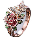 Adjustable alloy butterfly personality ring with dripping oil colour treatment showing fairy style flower and insect details
