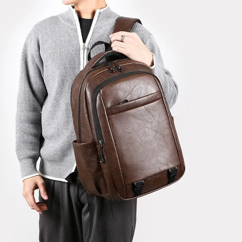 Men's large capacity leisure backpack in khaki, PU material, curved shoulder strap, 47x33x18cm