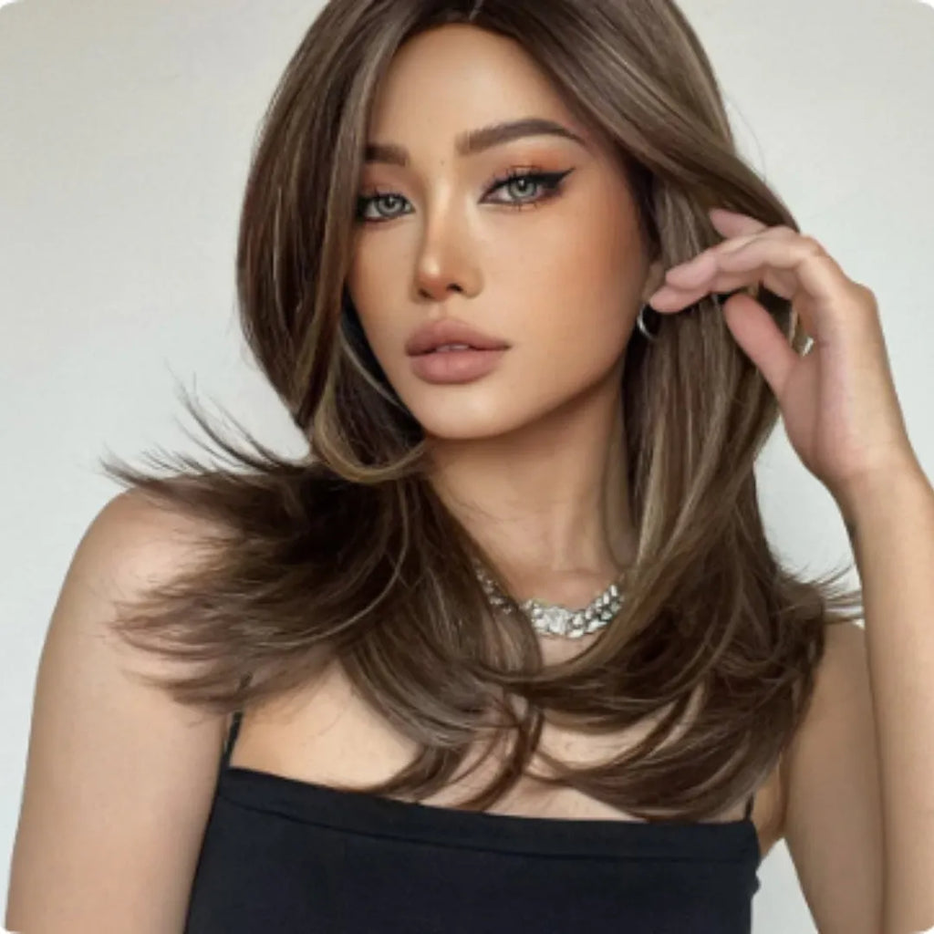 Mid-length platinum gradient colour synthetic wig with long curly hair and bangs