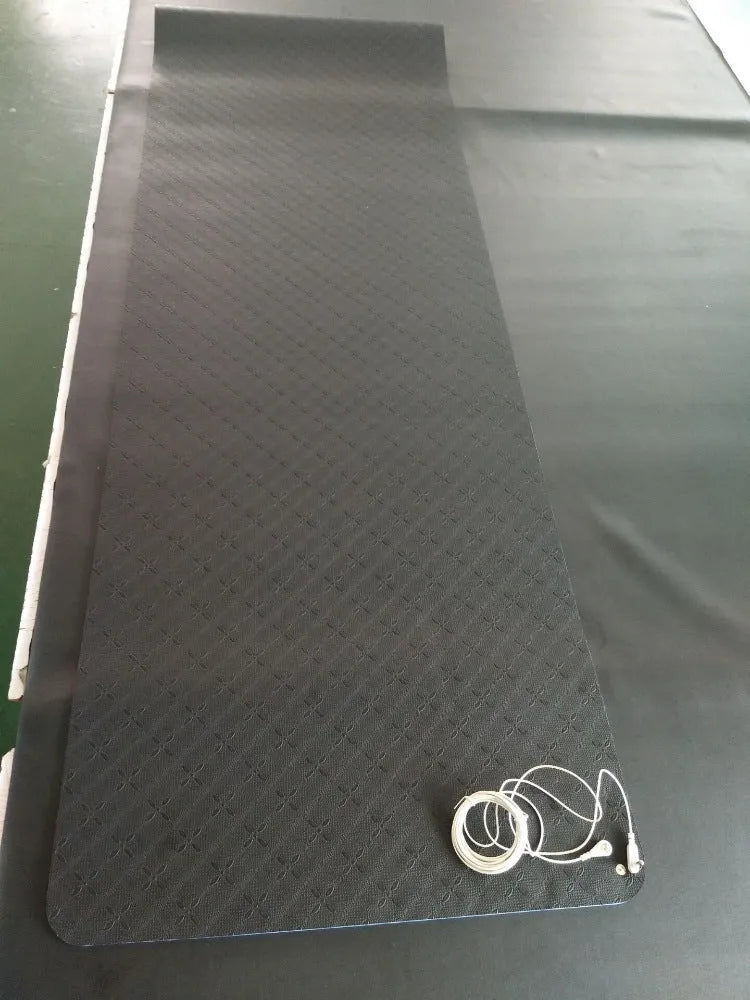 Blue conductive yoga mat with plant pattern, grounding wire, and 182x61cm dimensions
